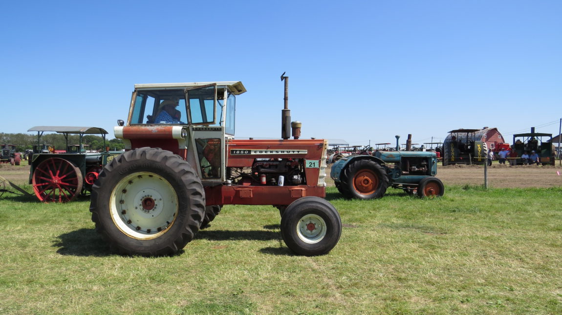 The Cockshutt 1850 is owned by Bert and Mark Drummond of Holland, Manitoba. The tractor to the right of the 1850 is a Cockshutt Oliver 90 which is in the Museum collection along with the Goold Shapely and Muir Beaver tractor to the left of the 1850.