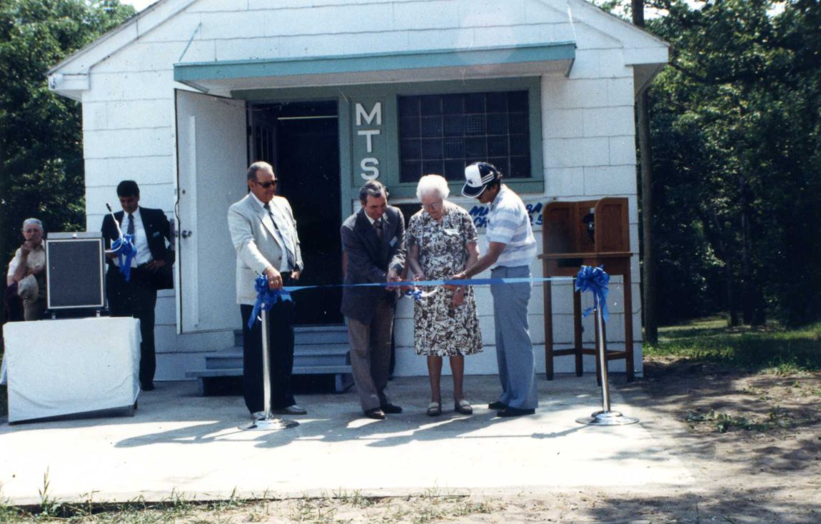 The ribbon cutting: Ed Tinkler (MTS), Rod Demoline (MTS), Effie McClean (MTS), Terry Farley (Museum)